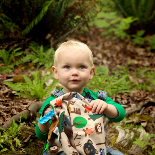 Wallace Krause of Happy Loud Life with his Learning Lovey Tag Blanket by Baby Jack