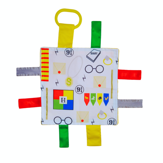 Harry Potter Wizarding World baby tag toy that teaches house colors from Hogwarts Wizard Lovey